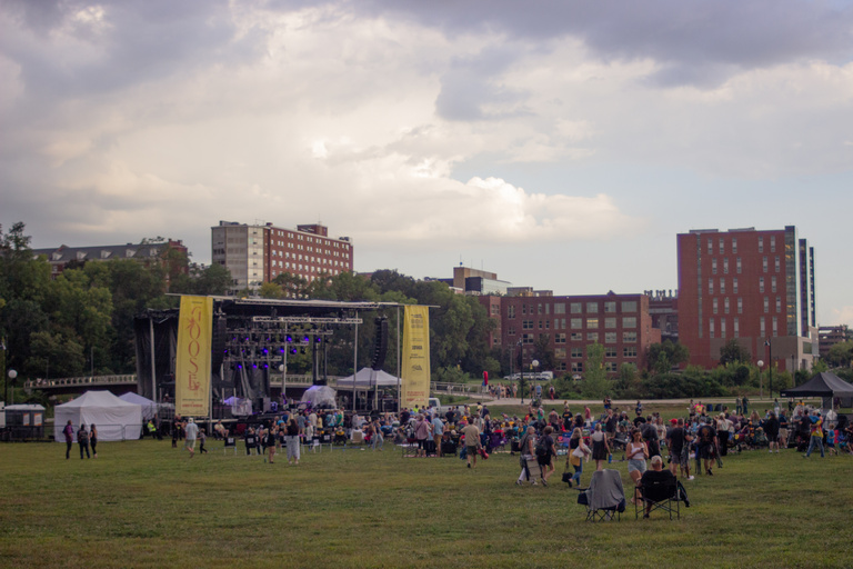 Crowd shot of the night with the campus in the background