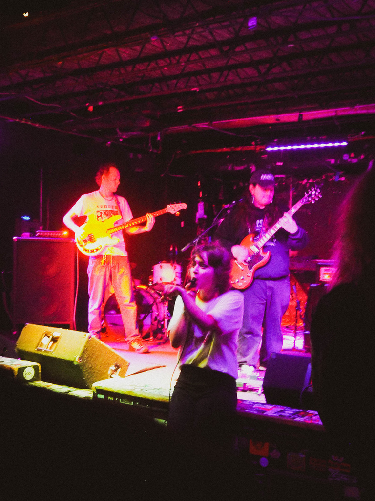 Recess on stage, leader singer in crowd off stage