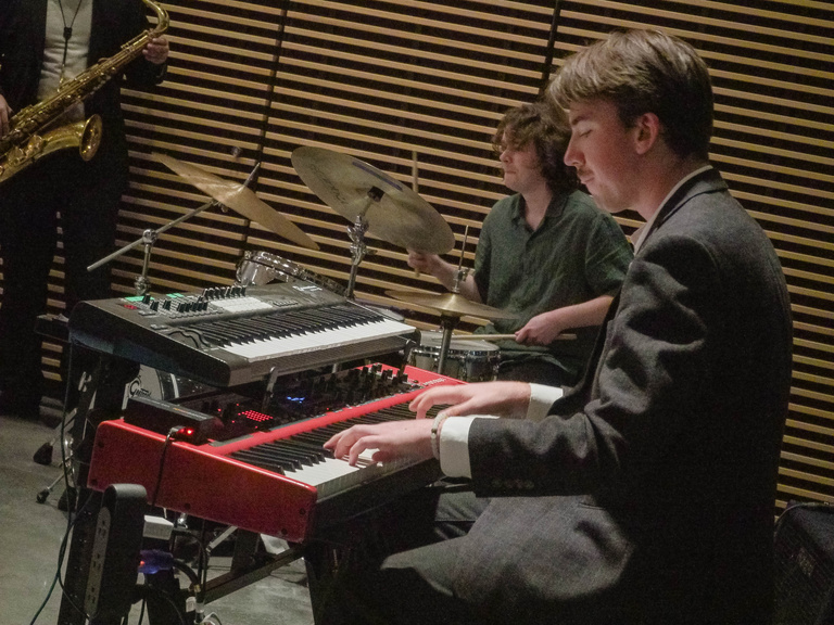 Keys and drummer of Mathuin Smith Trio performing during their set