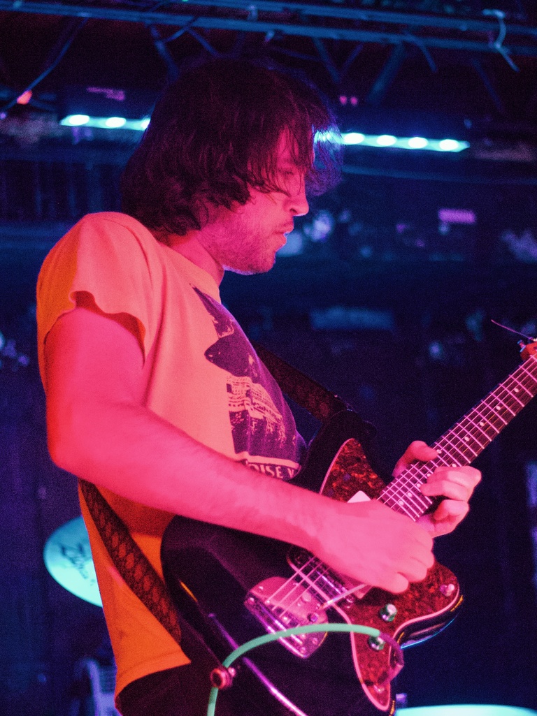 Image of guitar player on stage, Frankie and the Witch Fingers