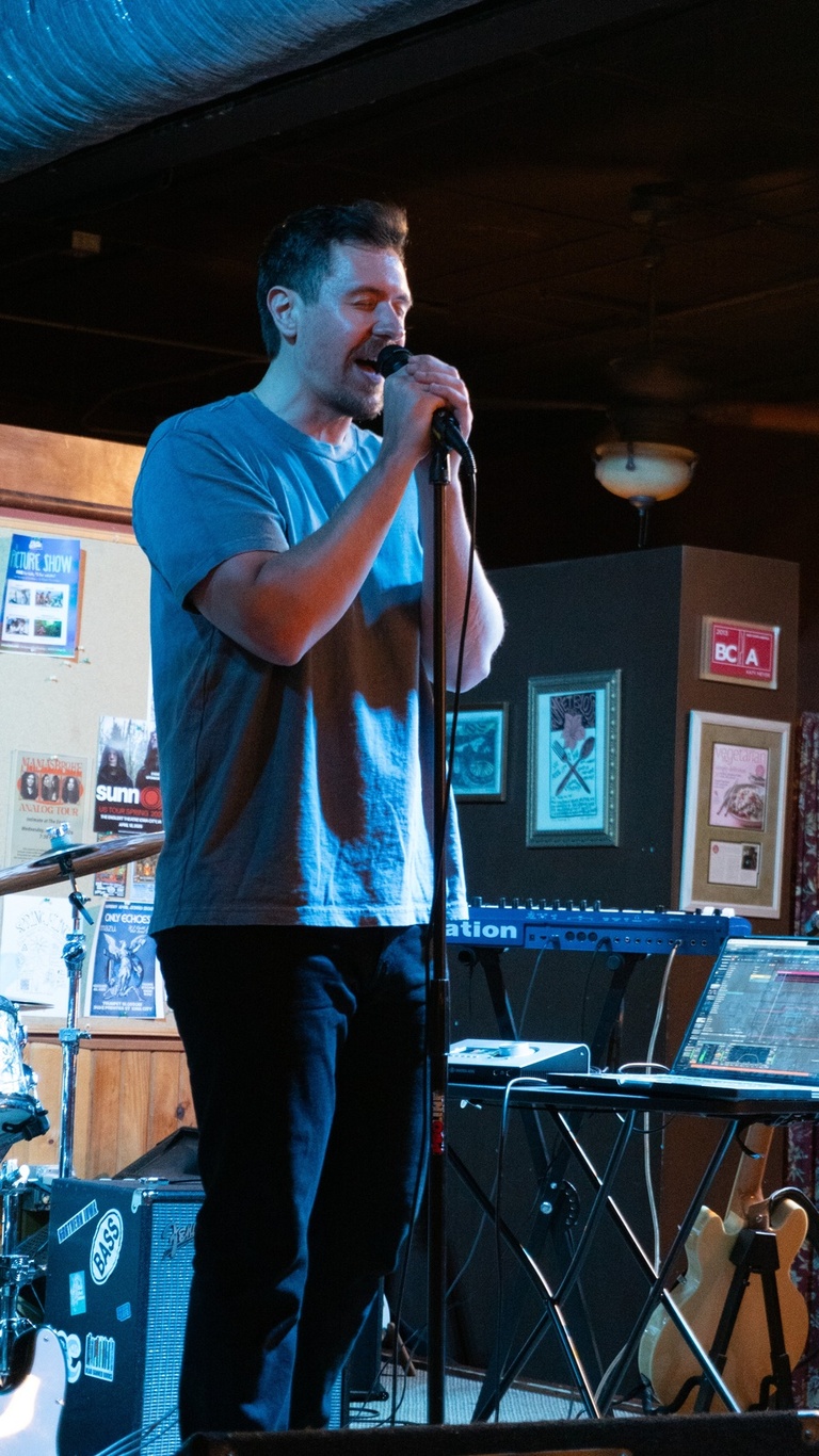 Jim Swim on stage at Trumpet Blossom