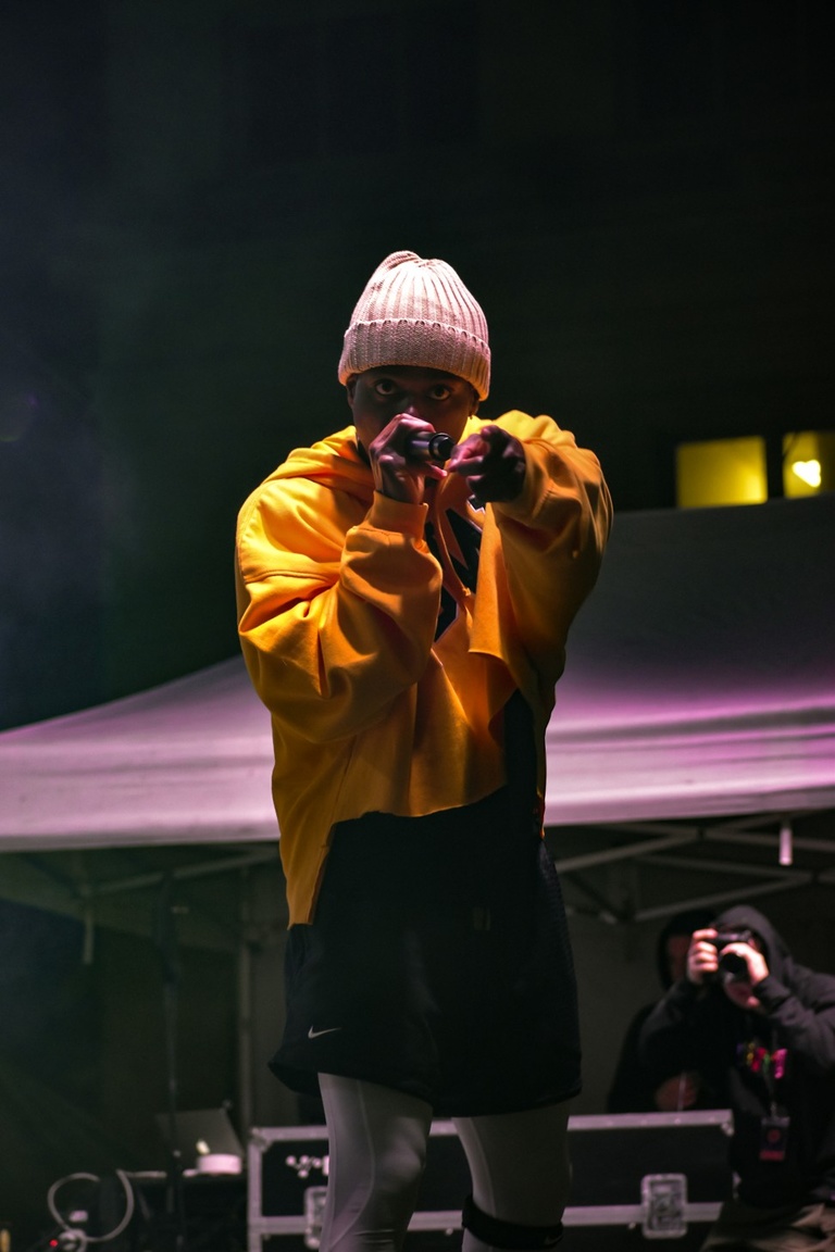 Tobi Lou performing and pointing at the camera