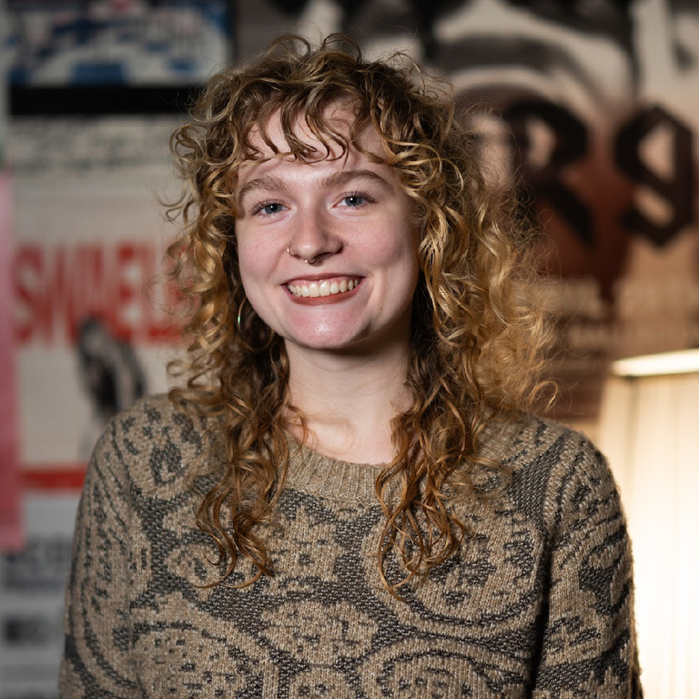 Hospitality Director, Kyra LaGrange, posing for a picture